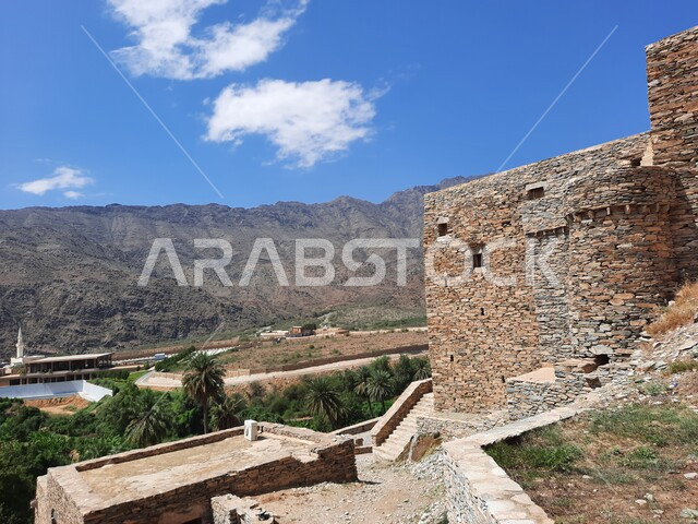 Marble Village in Dhi Ain Archaeological Site, Topography and Stone Mountains, Rock Formation and Shaping of the Mountain Height, Houses on Top of Mountain in Al Bahah Region in the Kingdom of Saudi Arabia, Famous Tourist Landmark, Place of Attraction and Attraction of Tourists