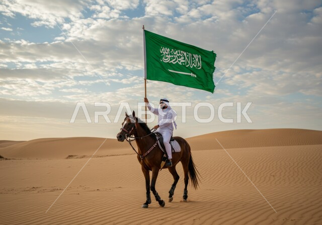 يوم العلم 11 مارس، إظهار مشاعر الاعتزاز بالوطن، نشر حب الخيل بين ابناء الوطن، شغف الفروسية وممارسة هواية ركوب الخيل في الصحراء، فارس عربي خليجي سعودي يمتطي الفرس العربي الأصيل ويرفع علم السعودية، اليوم الوطني السعودي 23 سبتمبر