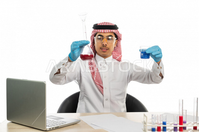 Portrait of a Saudi Arabian Gulf university student wearing traditional Gulf dress, sitting in a chemistry lab, using test tubes to conduct experiments in the laboratory, chemical reactions, research and development, the concept of biochemistry