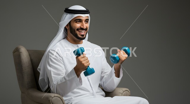 Physical activity to maintain physical fitness, portrait of an Emirati Gulf Arab man wearing a kandura and ghutra exercising with dumbbells, bodybuilding and muscle building, weightlifting exercises (dumbbells), heavy iron weights, gray background