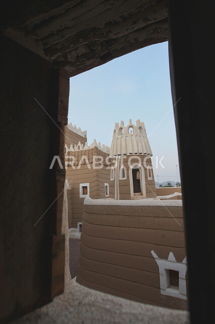 Famous historical heritage landmarks and places, simple mud houses and buildings, a brick house in one of the popular neighborhoods in the villages of the Kingdom of Saudi Arabia, the old Arab architectural style