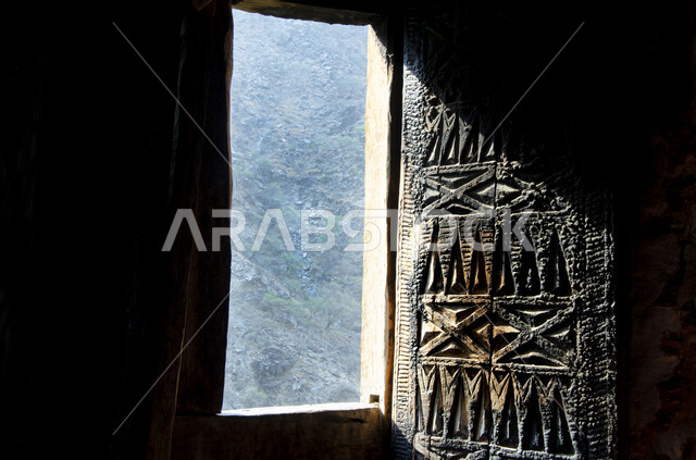 Simple mud houses and buildings, a brick house in one of the popular neighborhoods in the villages of the Kingdom of Saudi Arabia, the old Arab architectural style, famous historical landmarks and heritage sites