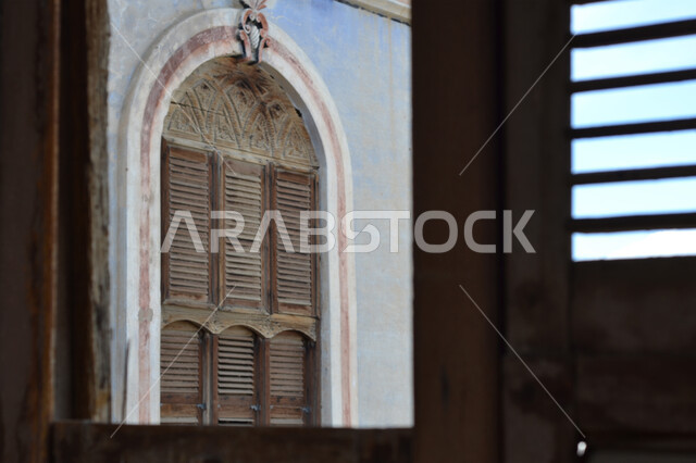 Simple mud houses and buildings, a brick house in one of the popular neighborhoods in the villages of the Kingdom of Saudi Arabia, the old Arab architectural style, famous historical landmarks and heritage sites