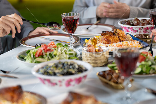 Banquets and invitations, family gatherings around the dining table, an iftar table filled with delicious dishes and appetizers during the holy month of Ramadan, a close-up photo of a varied dining table in a restaurant in the Emirates