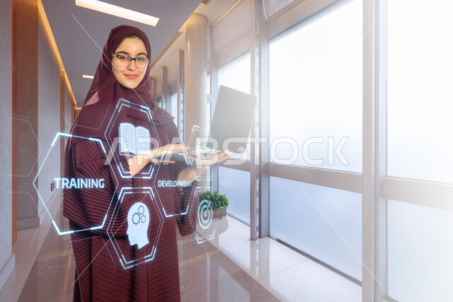 A Saudi Arabian Gulf university student who follows university lectures through advanced educational platforms through technical devices, distance education, e-learning, schools and universities, the development of education in the Kingdom of Saudi Arabia