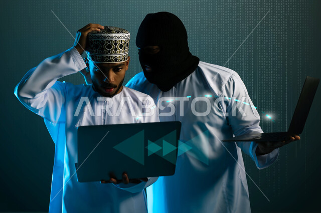 Algorithms to destroy digital accounts, cybersecurity infiltration, using a computer for illegal purposes, hacking and data theft, two masked Gulf Arab Omani hackers wearing dishdashas working in the field of digital piracy