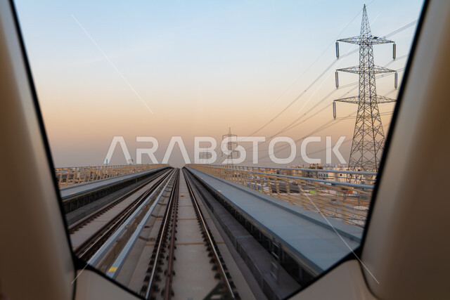 Urban development, progress, and infrastructure improvement, the Riyadh Metro Station in the capital, urban growth in construction in the Kingdom of Saudi Arabia, and interest in public services and transportation.