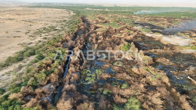 التأثر بأشعة الشمس، الجفاف والحرارة المرتفعة، صورة علوية للوادي الاخضر المحترق في جدة، اماكن طبيعية في المملكة العربية السعودية 