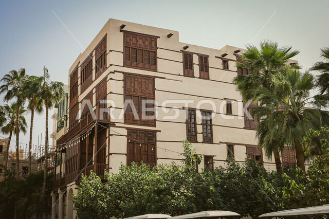 Old windows in the historic city of Jeddah, ancient Arab and Islamic architectural design, historic houses in the historic city of Jeddah, popular heritage tourist sites in the Kingdom of Saudi Arabia, historical landmarks in the Al-Balad district