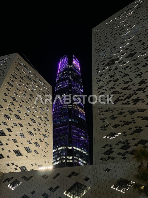 King Abdullah Financial District (KAFD) at night, towers and financial facilities in Riyadh, urban development and growth in Saudi Arabia, the architectural art of the famous buildings and skyscrapers in the Kingdom, the prosperity and achievement of economic and commercial renaissance