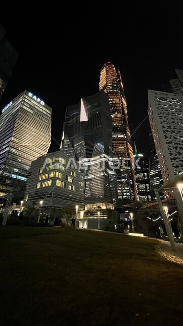 King Abdullah Financial District (KAFD) at night, towers and financial facilities in Riyadh, urban development and growth in Saudi Arabia, the architectural art of the famous buildings and skyscrapers in the Kingdom, the prosperity and achievement of economic and commercial renaissance