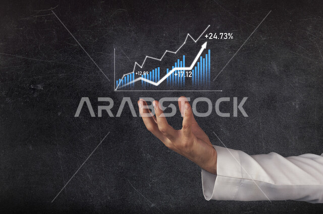 A Saudi Arabian Gulf man puts over his hand the stock chart, follow the stock market chart, monitor the rise and fall of the stock market, investment and trading in the stock market, the economy and financial growth, chart background
