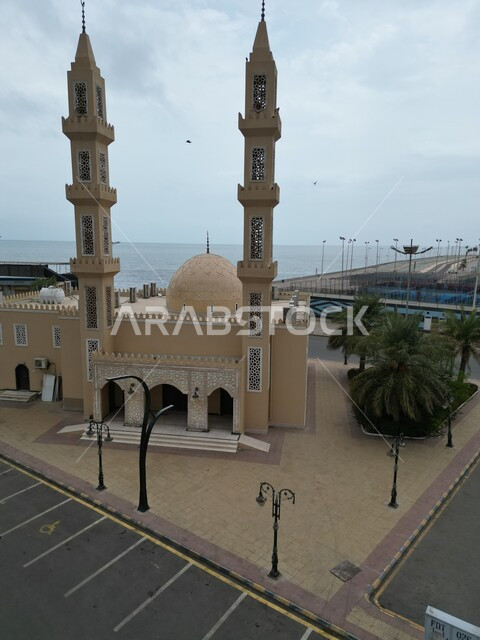 Jazan Mosque on the northern corniche in the Kingdom of Saudi Arabia, quiet and enjoyable outdoor seating, the seafront on the coast of the Arabian Gulf of the Red Sea, tourist places to enjoy in the city of Jazan