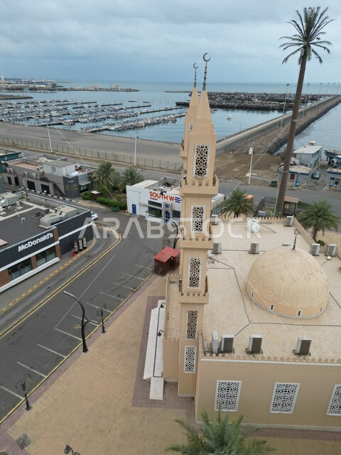 Jazan Mosque on the northern corniche in the Kingdom of Saudi Arabia, quiet and enjoyable outdoor seating, the seafront on the coast of the Arabian Gulf of the Red Sea, tourist places to enjoy in the city of Jazan