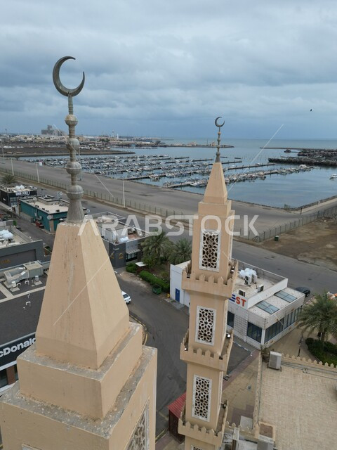 Jazan Mosque on the northern corniche in the Kingdom of Saudi Arabia, quiet and enjoyable outdoor seating, the seafront on the coast of the Arabian Gulf of the Red Sea, tourist places to enjoy in the city of Jazan