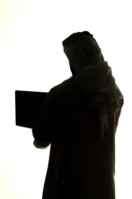 Use of technology devices, integration of modern technologies into daily life, surfing the internet, silhouette of an Arab Gulf Emirati man, using a laptop, remote work, e-marketing, professions and jobs, white background