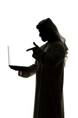 Integrating modern technologies into daily life, using technology devices, silhouette of an Arab Gulf Emirati man, using a laptop, surfing the internet, working remotely, e-marketing, professions and jobs, white background