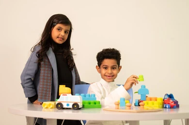 Two Saudi children are sitting in kindergartens and nurseries, engaging in many fun and different activities, a group of collective activities, enjoying recreational games, and developing mental and intellectual skills. Two Saudi children are sitting in kindergartens and nurseries, engaging in many fun and different activities, a group of collective activities, enjoying recreational games, and developing mental and intellectual skills.