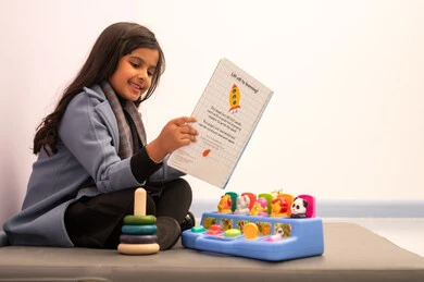 Kindergartens and nurseries, performing many fun activities, spending wonderful times, a Saudi girl wearing casual attire engaging in various activities, games for entertainment and fun, enjoyment during the summer vacation. Kindergartens and nurseries, performing many fun activities, spending wonderful times, a Saudi girl wearing casual attire engaging in various activities, games for entertainment and fun, enjoyment during the summer vacation.