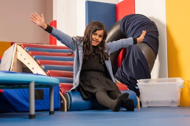 The amusement park in the Kingdom of Saudi Arabia, enjoyable summer atmosphere, a Gulf Arab Omani girl enjoying sliding down the slide, enjoying recreational games, fun and entertainment games. The amusement park in the Kingdom of Saudi Arabia, enjoyable summer atmosphere, a Gulf Arab Omani girl enjoying sliding down the slide, enjoying recreational games, fun and entertainment games.