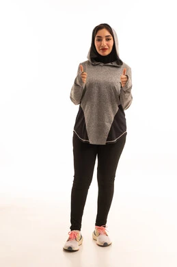 Physical activity to maintain health and physical fitness, a portrait of a Saudi Gulf Arab girl wearing sportswear, exercising with dumbbells, a healthy lifestyle, weightlifting exercises (dumbbells), lifting heavy weights, full-length image, white background.