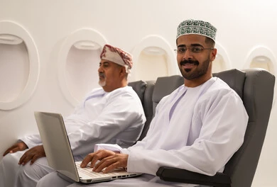 النظر الى الكاميرا بايماءات السعادة و السرور, إدارة شؤون الأعمال وتنظيمها عن بعد، رجل عربي خليجي عماني يرتدي الدشداشة و الكمه يجلس داخل الطائرة فى رحله جوية برفقة والده المسن يقوم بالعمل على الحاسوب المحمول , استخدام الأجهزة التكنولوجية الحديثة والمتطورة , مفهوم السياحه و السفر النظر الى الكاميرا بايماءات السعادة و السرور, إدارة شؤون الأعمال وتنظيمها عن بعد، رجل عربي خليجي عماني يرتدي الدشداشة و الكمه يجلس داخل الطائرة فى رحله جوية برفقة والده المسن يقوم بالعمل على الحاسوب المحمول , استخدام الأجهزة التكنولوجية الحديثة والمتطورة , مفهوم السياحه و السفر