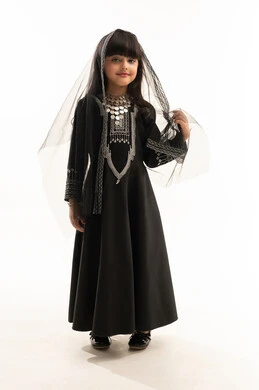 Celebrating the founding anniversary of the first Saudi state on February 22, looking at the camera with gestures of pride in Saudi heritage, wearing the Northern Region costume, the day of our beginnings 1727 AD, side portrait of a smiling Saudi Arabian Gulf Arab girl wearing a muhthal and a sheila, full body, white background