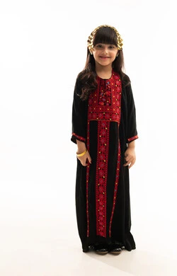 Looking at the camera with gestures of happiness and pride in Saudi heritage, wearing the Northern Region costume, the day of our beginnings in 1727 AD, the anniversary of the founding of the first Saudi state on February 22, portrait of a smiling Saudi Arabian Gulf girl wearing a black muhthal, full body, white background