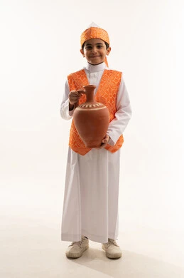 Popular handicrafts and cradle, wearing the costumes of the Western region on a national occasion, the day of our beginnings, 1727 AD, portrait of a Saudi Arabian Gulf boy wearing the traditional Sudairi holding a pottery pot, celebrating the anniversary of the founding of the first Saudi state, February 22, full body image, white background