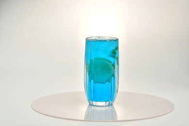 Healthy, beneficial and nutritious drinks, delicious cold natural juices, refreshing seasonal fruit drinks, Saudi agricultural crops and local national fruits, a glass of delicious summer fruit juice, white background