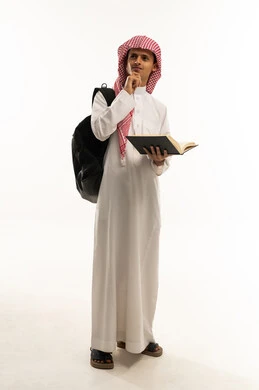 Self-education and acquiring knowledge, enjoying the hobby of reading, a portrait of an Arab Saudi Gulf student wearing traditional thobe and shemagh with a backpack holding a book in his hand, looking up with gestures of thinking and concentration, full-body, white background.