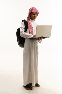 Monitoring available online e-learning platforms, integrating education with technology, solving homework assignments, a portrait of an Arab Gulf Saudi student wearing traditional attire and a headscarf, carrying a backpack, using a laptop, full-body, white background.