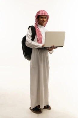 Integrating education with technology, following available online e-learning platforms, completing homework assignments, a portrait of an Arab Gulf Saudi student wearing traditional attire and a headscarf, carrying a backpack, using a laptop, full-body, white background.