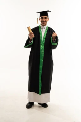 Pride in reaching dreams and success, raising a fist with expressions of achievement, looking at the camera with gestures of happiness and joy, celebrating the completion of university studies, a portrait of a young Arab Gulf Saudi graduate wearing a cap and graduation gown holding a certificate in his hand, full-body, white background. Pride in reaching dreams and success, raising a fist with expressions of achievement, looking at the camera with gestures of happiness and joy, celebrating the completion of university studies, a portrait of a young Arab Gulf Saudi graduate wearing a cap and graduation gown holding a certificate in his hand, full-body, white background.