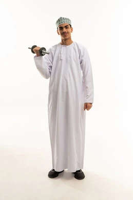 Physical activity to maintain health and physical fitness, a portrait of a young Arab Gulf Omani man wearing a dishdasha and kumma practicing exercises with dumbbells, bodybuilding and muscle building, weightlifting exercises (dumbbells), lifting heavy weights, gestures of effort and fatigue, full-body shot, white background.