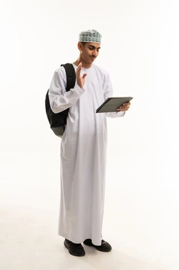 Hand gestures indicating welcome, preparing for online university lectures, a portrait of an Arab Gulf Omani university student wearing a dishdasha and kumma making a video call through a tablet device, education in the Sultanate of Oman, full-length body, white background.