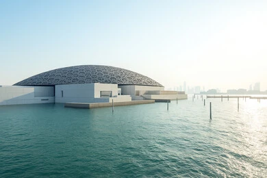 Famous tourist places and landmarks in the United Arab Emirates, distinctive designs and decorations, the architectural art of towers and skyscrapers in the modern style, an Emirati vision of the future, the Louvre Museum overlooking the Arabian Gulf coast during the day in the Emirate of Dubai