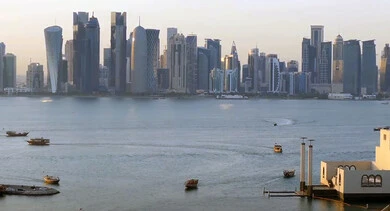 The architectural art of towers and skyscrapers in the State of Qatar, buildings and facilities overlooking the sea, tourist places and areas in Doha, enjoying the calm sea atmosphere on the shores of the Arabian Gulf