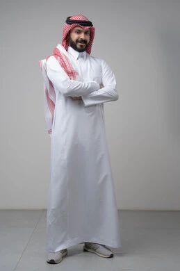 Taking selfies for official documents, taking care and attention to one's appearance, the concept of elegance and masculinity, a portrait of a young Saudi Arabian Gulf man wearing traditional clothing, standing with his hands crossed, looking at the camera with an expression of pleasure and self-confidence, full body, white background
