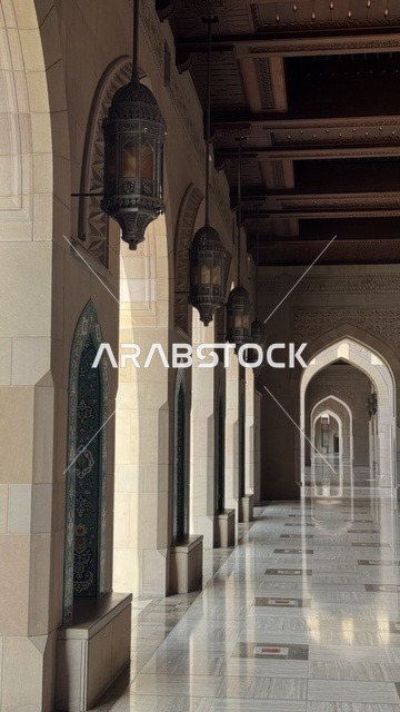Performing religious duties, modern Islamic architecture, famous Islamic religious sites and landmarks in the Sultanate of Oman, Sultan Qaboos Grand Mosque in Muscat Governorate in the Sultanate of Oman, arches in the corridor of the Sultan's Mosque, worship and drawing closer to God