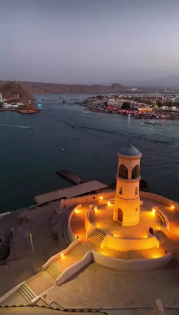 Ras Al Mail Tower in the Sultanate of Oman, Al Aija Lighthouse illuminated at night in the Wilayat of Sur, the oldest lighthouse in Oman, a historical tourist attraction, the architectural art of maritime heritage