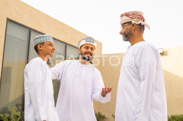 The role of the father in the lives of children, strengthening family bonds, spending the weekend in an Omani chalet, sharing wonderful moments for an Omani family, a family reception in the garden of one of the chalets, hugs between grandparents and grandchildren, enjoying fun times with family members, family visits and family gatherings.