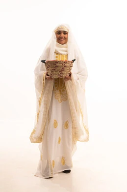 Old popular professions and handicrafts, looking at the camera with expressions of pride and honor, the day we began 1727 AD, a portrait of a smiling Saudi Arabian Gulf woman wearing a sheila and a neshel, holding a straw basket in her hand, wearing the costumes of the Eastern Province, the anniversary of the founding of the first Saudi state, February 22, white background