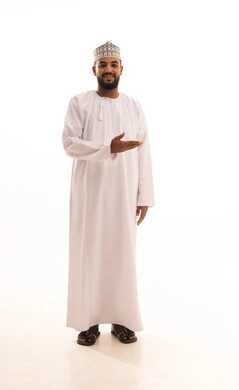 Welcoming and receiving with love and cheerfulness, a portrait of a young Arab Gulf Omani man wearing a dishdasha and kumma, looking at the camera with his hands open in gestures of joy at seeing someone, expressions of happiness and joy, full-body image, white background.