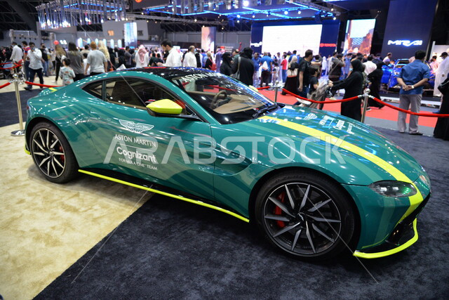 Green Aston Martin Vantage, luxury sports car, Jeddah International Motor Show at the Dome in Jeddah in Saudi Arabia, Classic Car Show in Jeddah, Car events and exhibitions in Saudi