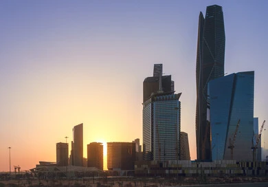 The architectural art of the Kingdom's famous buildings and skyscrapers, achieving economic and commercial renaissance, King Abdullah Financial District (KAFD) at night, financial facilities and towers in Riyadh, urban growth and development in Saudi Arabia