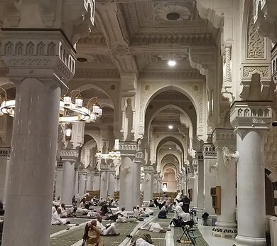 Worship and closeness to God, a sacred Islamic religious landmark in the Kingdom of Saudi Arabia, the interior architectural art of mosques in the Islamic style, decorations and chandeliers of the Prophet's Chamber inside the Prophet's Mosque