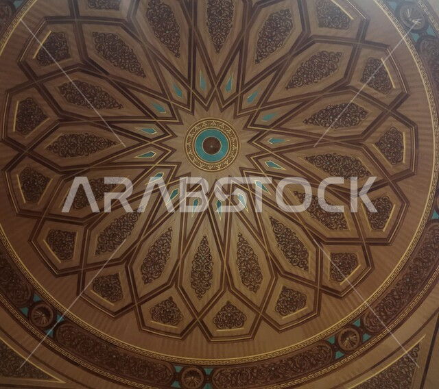 Decorations and chandeliers of the Prophet's Chamber inside the Prophet's Mosque, worship and closeness to God, a sacred Islamic religious landmark in the Kingdom of Saudi Arabia, the interior architectural art of mosques in the Islamic style