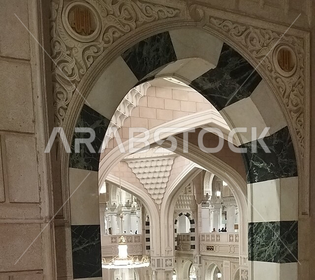 Islamic style interior architecture of mosques, decorations and chandeliers of the Prophet's Chamber inside the Prophet's Mosque, worship and closeness to God, a sacred Islamic religious landmark in the Kingdom of Saudi Arabia