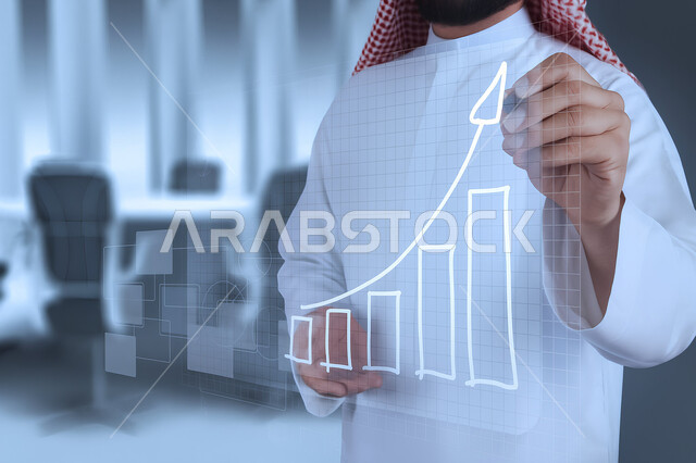 تحليل البيانات المالية والمصرفية، مراقبة الرسوم والمخططات البيانية، سوق البورصة العالمي، تداول العملة الرقمية، مفهوم التجارة والاقتصاد، ارتفاع وانخفاض الأسهم, رجل عربي خليجي سعودي يرتدي الشماغ والثوب التقليدي يقوم بلمس رسم بياني هولوجرامي توضيحي للمؤشرات الاقتصادية 